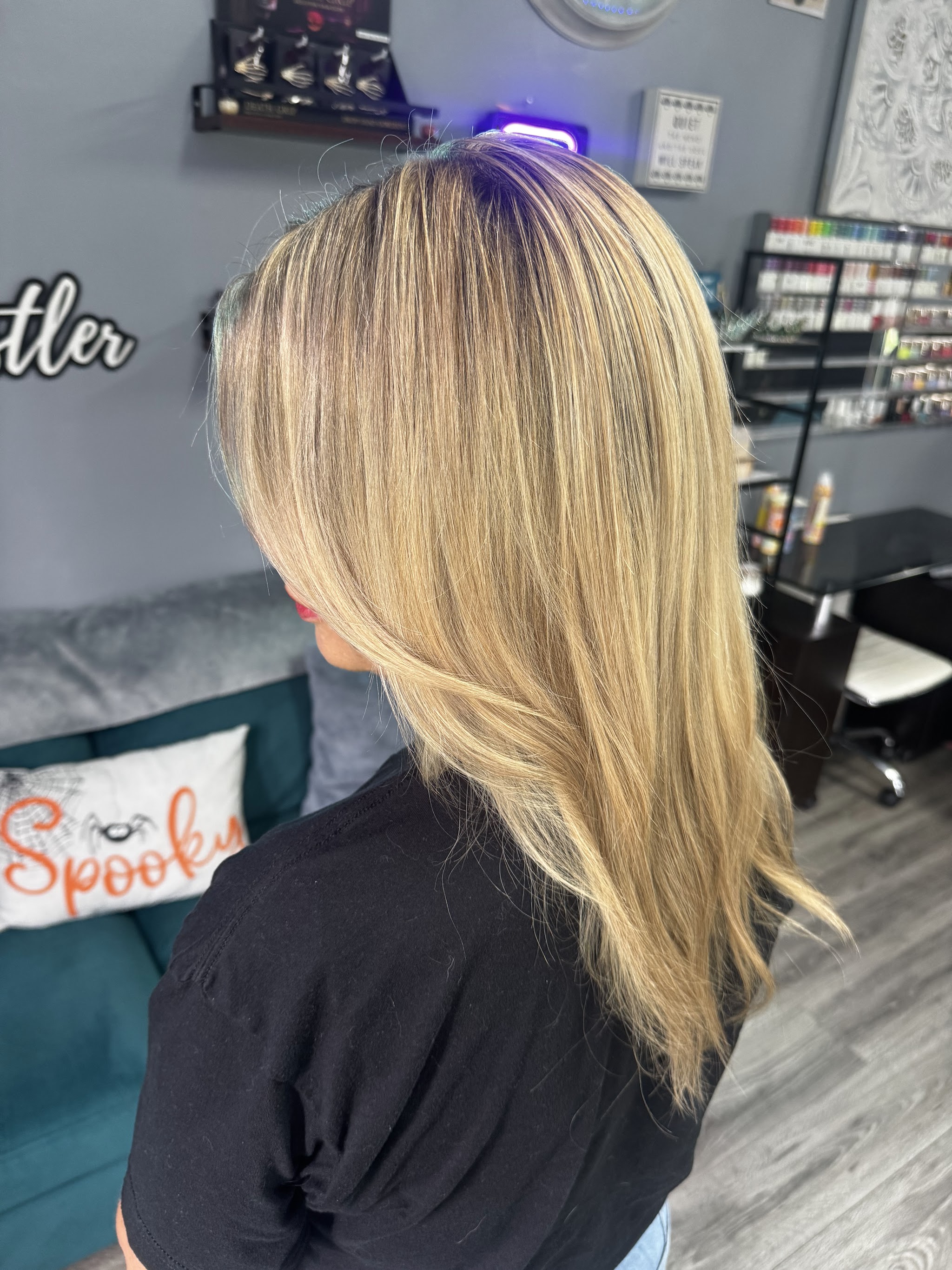 Long golden blonde layers from behind
